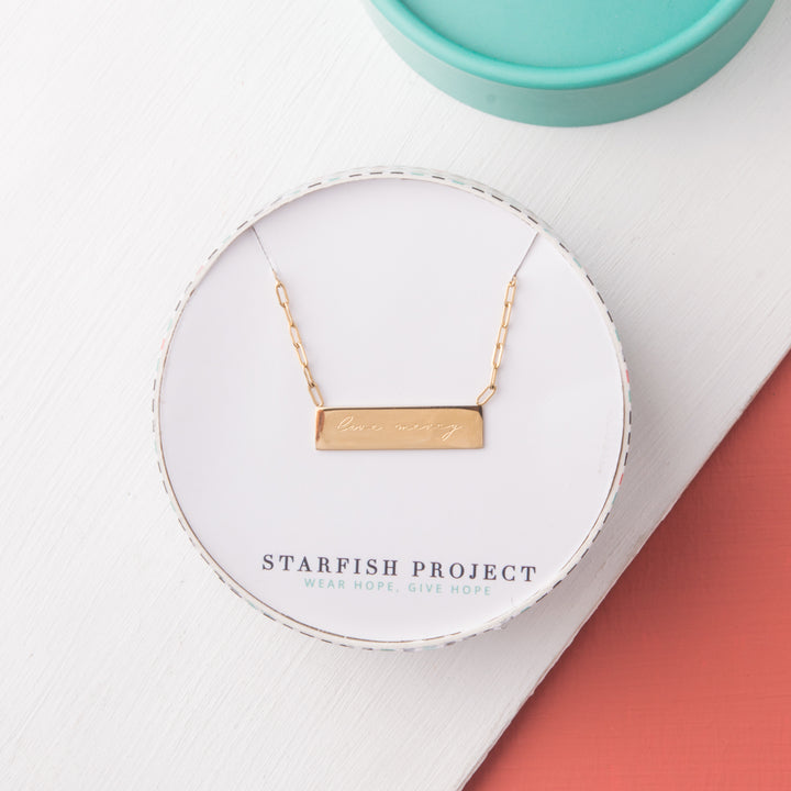 GIVE MERCY GOLD BAR NECKLACE